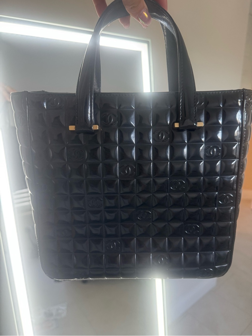 CHANEL Black Quilted Patent Leather Tote with Gold Accents